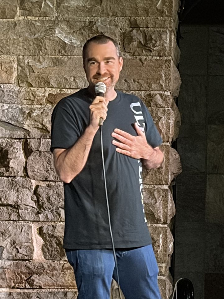 Jeremy Lomax performing stand-up